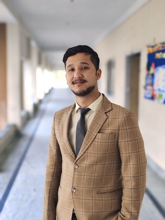 Middle School teacher looking into the camera