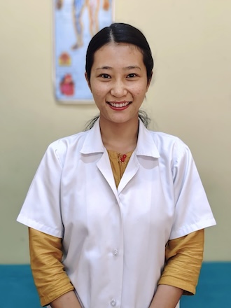 Pastoral teacher looking into the camera