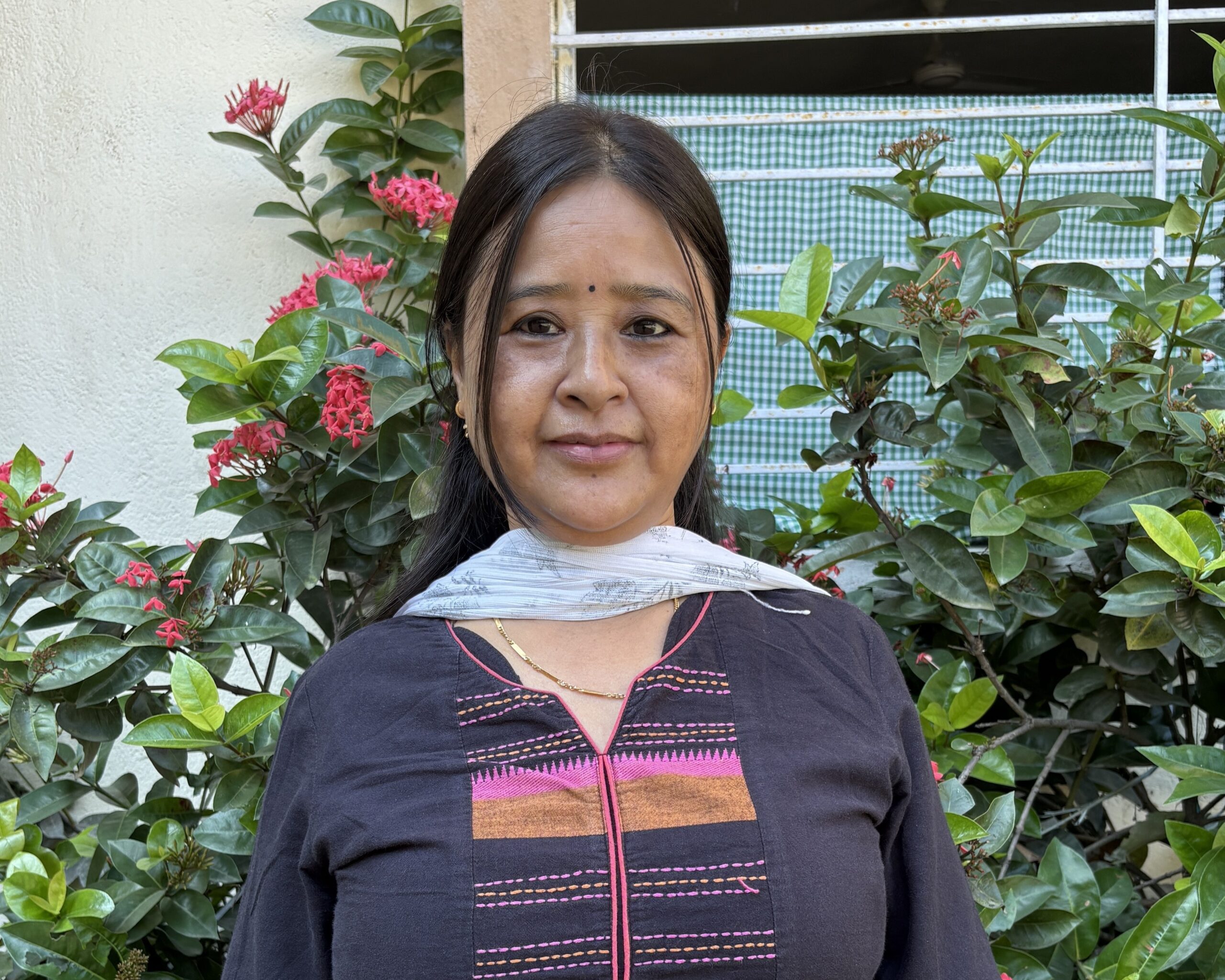 Pastoral teacher looking into the camera