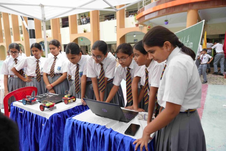students watching computers