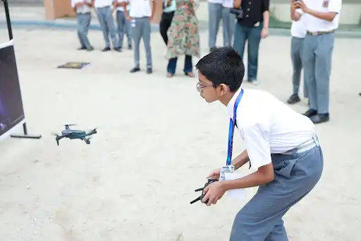 Student competes in the Sky Sprint: Drone Race.