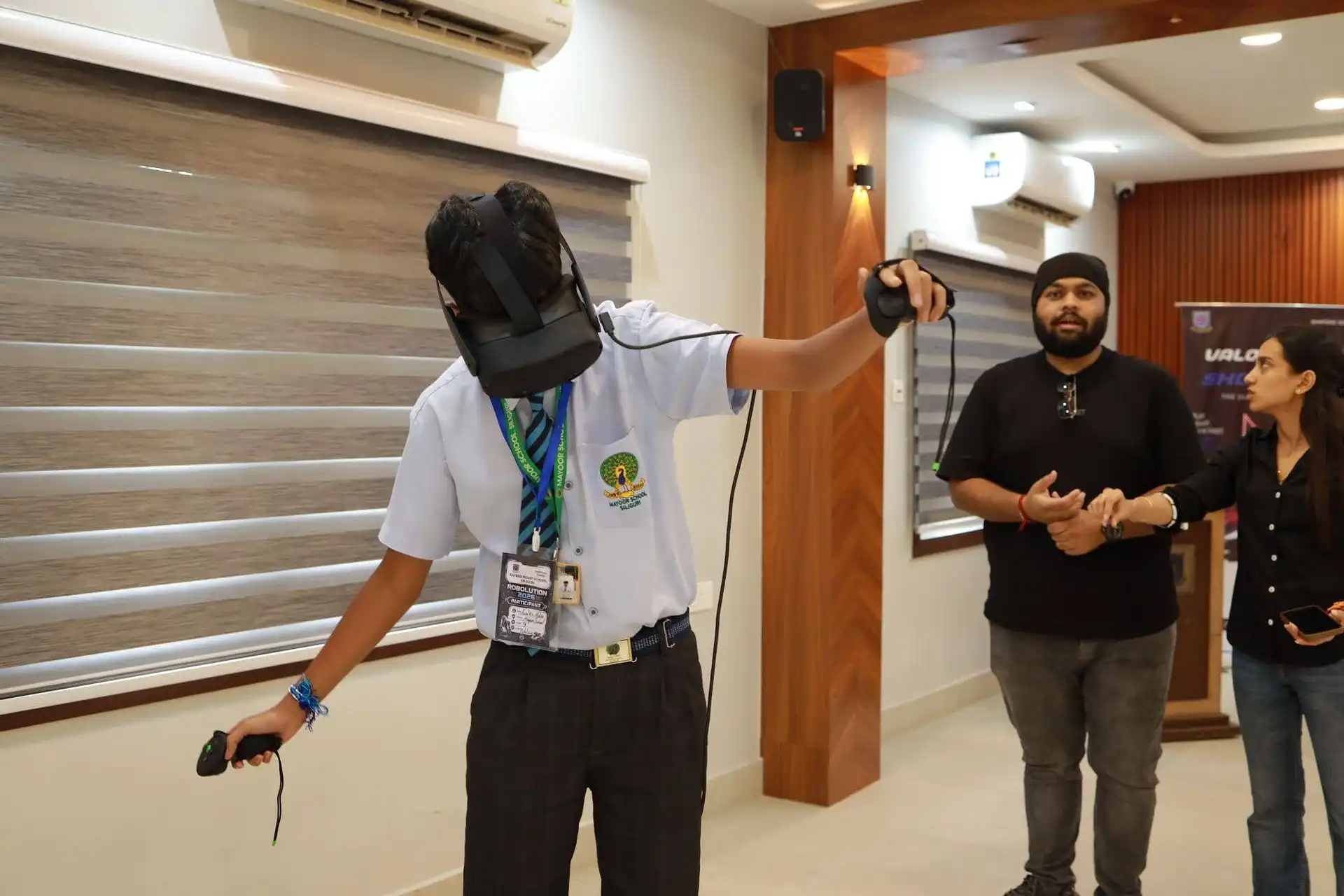A student takes part in the Pickleverse: VR Pickleball competition at Robolution 2026.